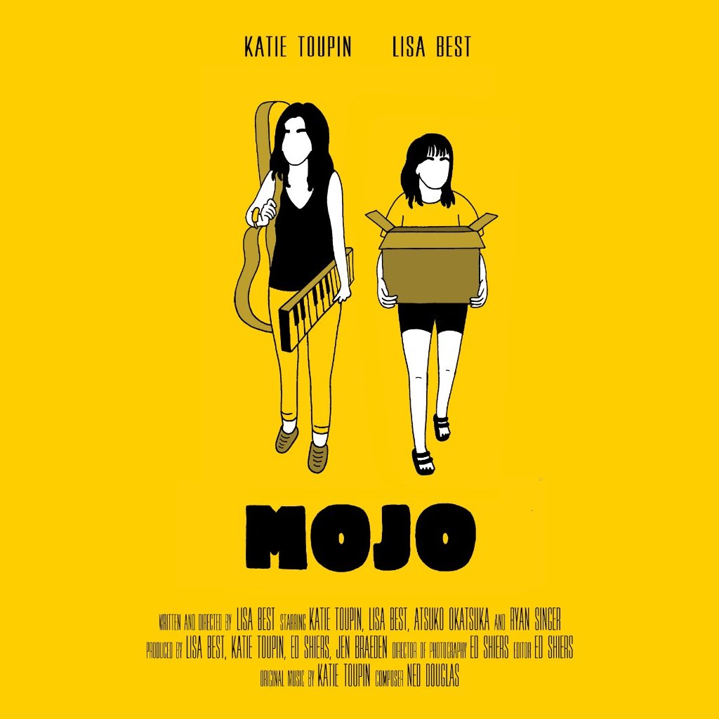 Yellow poster for Mojo. Two drawn figures walk forward, one with a keyboard and one carrying a box. The names at the top read Katie Toupin and Lisa Best.